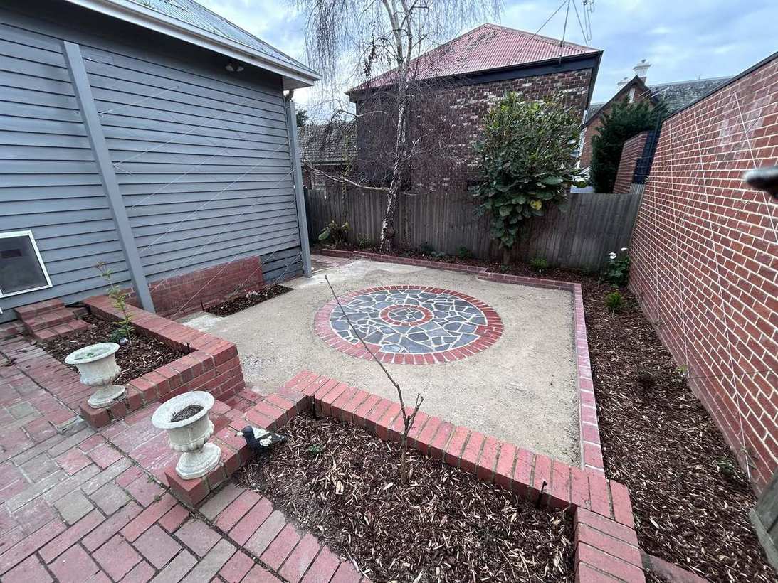 Courtyard landscaping — mosaic centrepiece