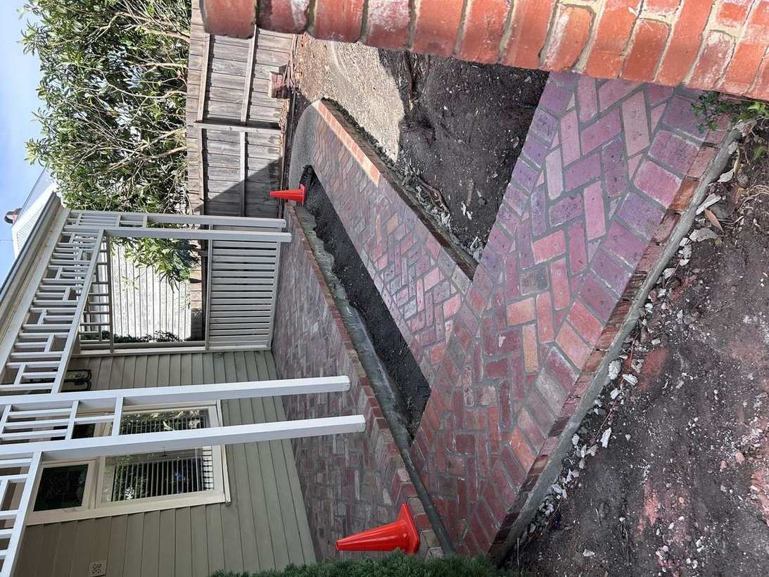 Herringbone brick paving — installation