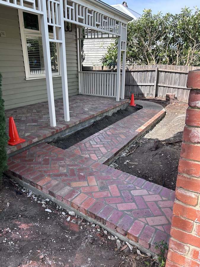 Herringbone brick paving — installation