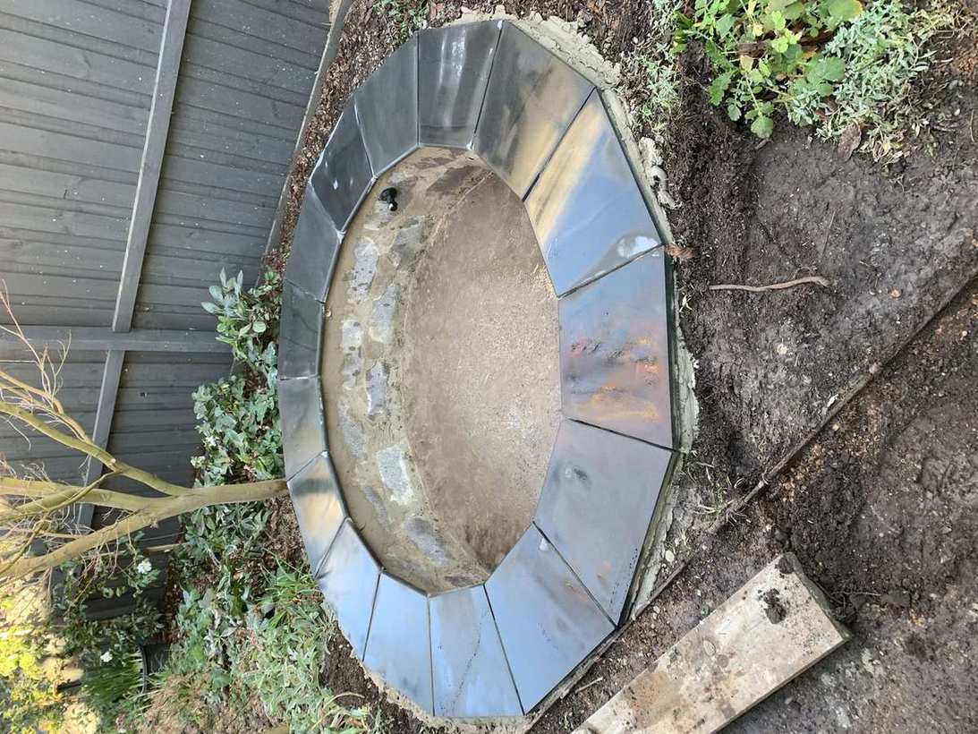 Pond construction — bluestone coping fitted
